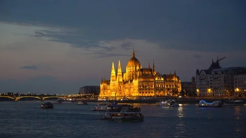 Budapest, Hungary. Steamships float on the Danube River at night Stock Footage 94971658