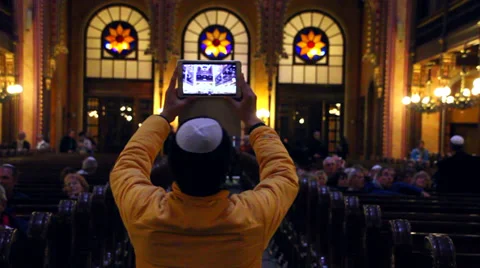 BUDAPEST SYNAGOGUE INSIDE 10 CU BACK VIEW TOURIST TAKING PHOTO Stock Footage 39437839