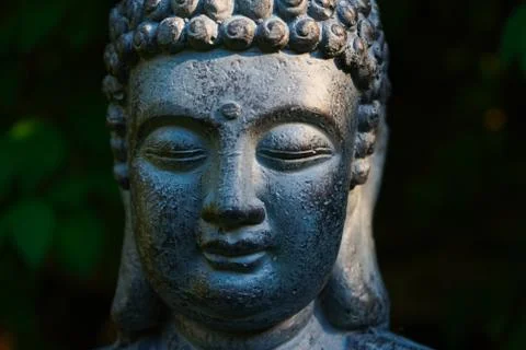 Buddah statue on dark background Stock Photos