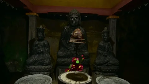 Buddha and Celestial Deities Shrouded in a Mystical Aura of the Ancient Temple Stock Footage 296491391