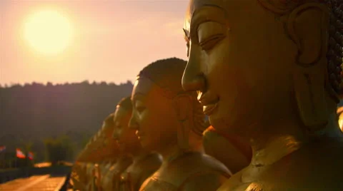 Buddha and the light of the evening sun. Stock Footage 45838763