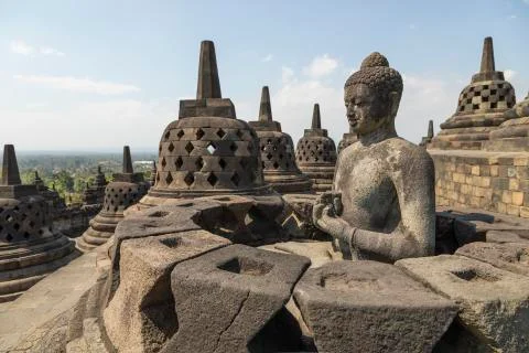 Buddha Dharmachakra mudra reaching Nirvana, Borobudur temple Stock Photos