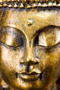 Buddha face close up Stock Photos