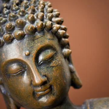 Buddha face close up Stock Photos