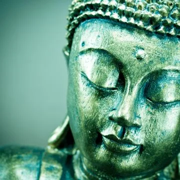 Buddha face green Stock Photos
