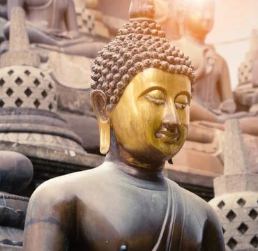 Buddha face statue closeup Stock Photos