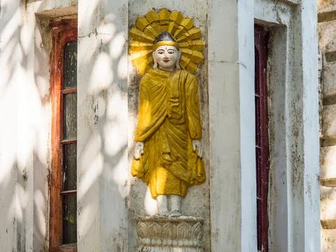 Buddha image on building in Yangon Stock Photos