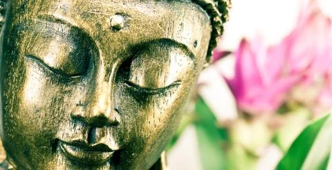 Buddha with orchid Foto stock