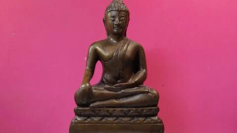 Buddha on a pink background Stock-Fotos