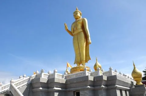 Buddha standing on a mountain Stock Photos