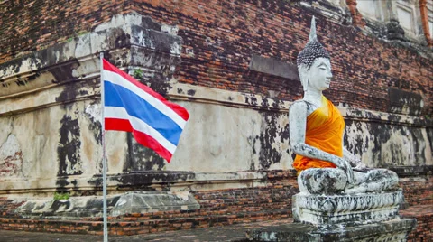 Buddha statue and thai flag in the temple 库存影片 34577757