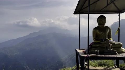 Buddha statue on the background of a mountain Stock Footage 218318361