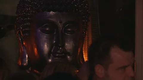 Buddha statue in Bar Stock Footage 112678934