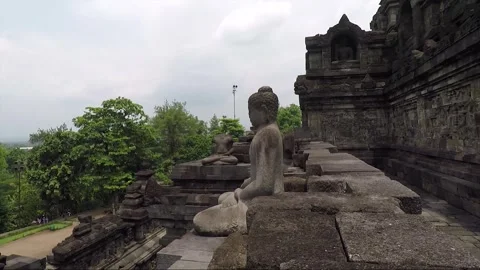 Buddha Statue, Bas Reliefs, Borobudur Temple Terrace, Java, Indonesia Stock Footage 243201236