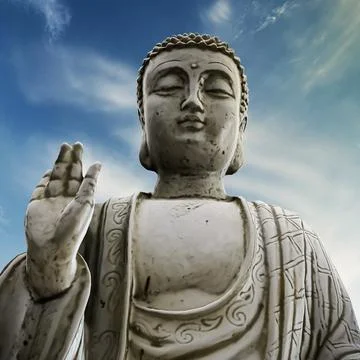 Buddha statue below a blue sky Stock Illustration