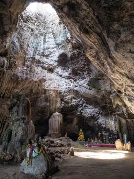 Buddha statue in the cave Stock Photos