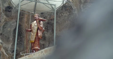 Buddha statue in the cave.Brown buddha statue. Stock Footage 266440940