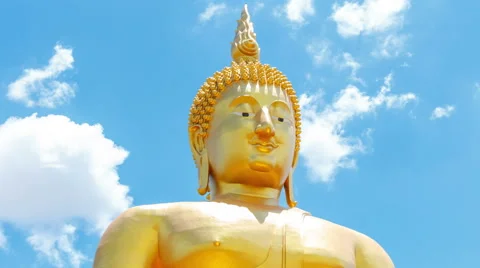 Buddha statue on cloud and blue sky at temple of Thailand Stock Footage 52357177