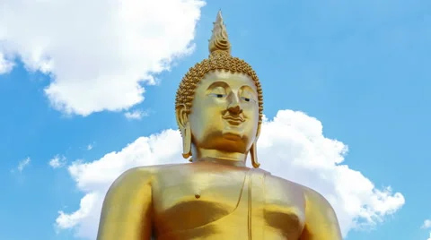 Buddha statue on cloud and blue sky at temple of Thailand Stock Footage 52357283