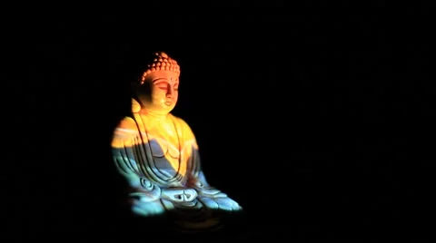 Buddha statue with colorful light Vidéo 64797963