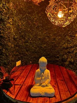 Buddha Statue in Cozy Setting Stock Photos