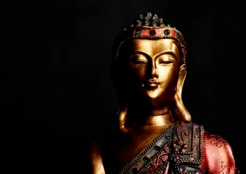 Buddha Statue on Dark Background Stock Photos