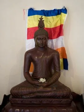 Buddha statue with flag Stock Photos