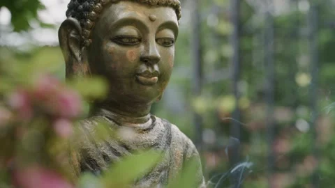 Buddha statue with incense, slow motion Stock Footage 338162567
