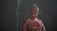 Buddha Statue With Incense. Symbols Of Buddhism. Spiritual Life Of Asia Stock Footage