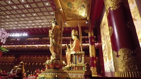 Buddha Statue, Inside Hundred Dragon Hall, Buddha Tooth Relic Temple, Singapore Video stock 329185430