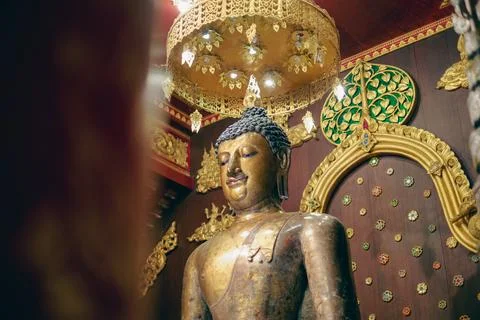 Buddha statue inside a temple Stock Photos