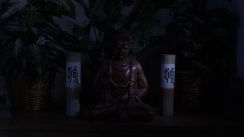 Buddha Statue Meditating on Shelf Video stock 82595769
