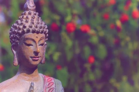 Buddha Statue in Outdoor Garden With Blurred Background Stock Photos