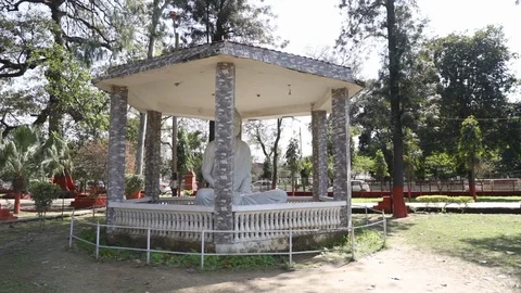 Buddha statue in the public park Stock Footage 128122243