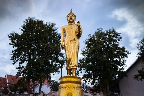 Buddha statue standing agints sky Stock Photos