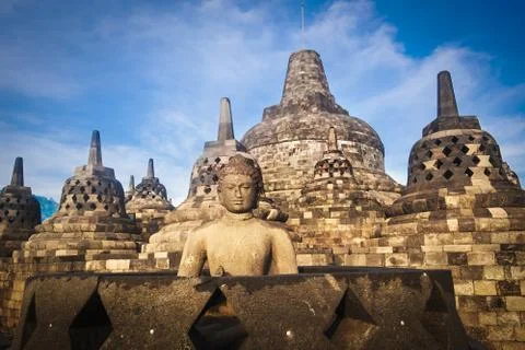 Buddha Statue at Sunset at Borobudur, Java, Indonesia Stock Photos