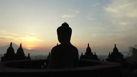 Buddha Statue at Sunset at Borobudur Temple, Java, Indonesia2 Stock Footage 131151280