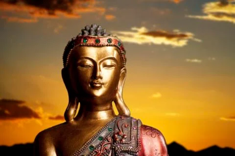 Buddha Statue at Sunset Stock Photos