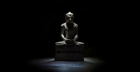 Buddha statue on a table Stock Photos