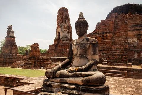 Buddha statue in temple complex at Wat Mahathat in Ayutthaya. Ayutthaya is th Stock Photos
