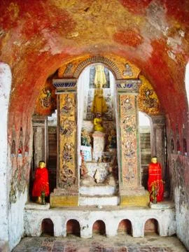 A buddha statue in a temple Stock Photos