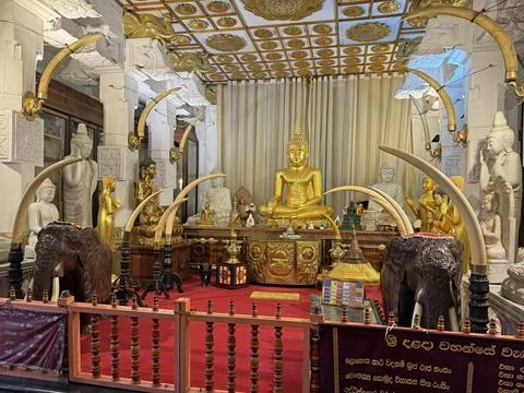 Buddha statue in the Temple of Tooth. Stock Photos