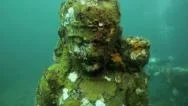 Buddha Statue Underwater On Ocean Floor Stock Footage