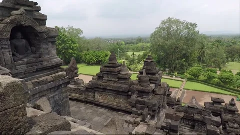 Buddha Statue, View from the Wall of Temple Terrace, Borobudur, Java, Indonesia Stock Footage 244242199