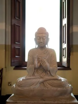 Buddha statue with window Stock Photos