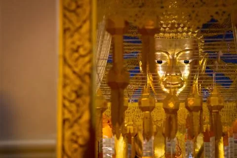 Buddha statue on yellow background Fotos Stock