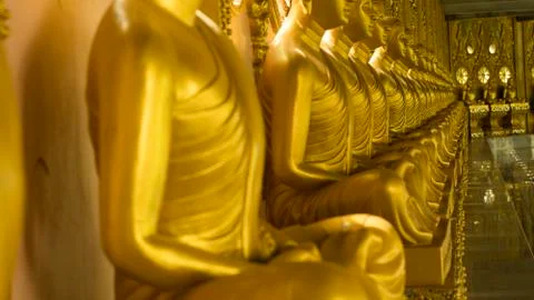 The Buddha statues located in the temple. Stock Photos