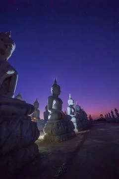 Buddha statues in twilight Stock Photos