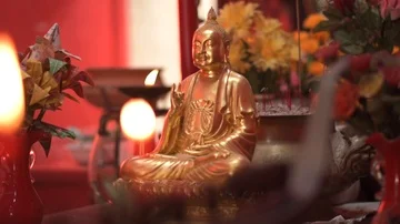 Buddha Statuette and Candles Stock Footage 85515923