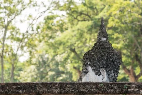 Buddha on a stone platform Stock Photos